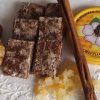 Close-up of my homemade Basler Läckerli (spiced gingerbreads) with ingredients